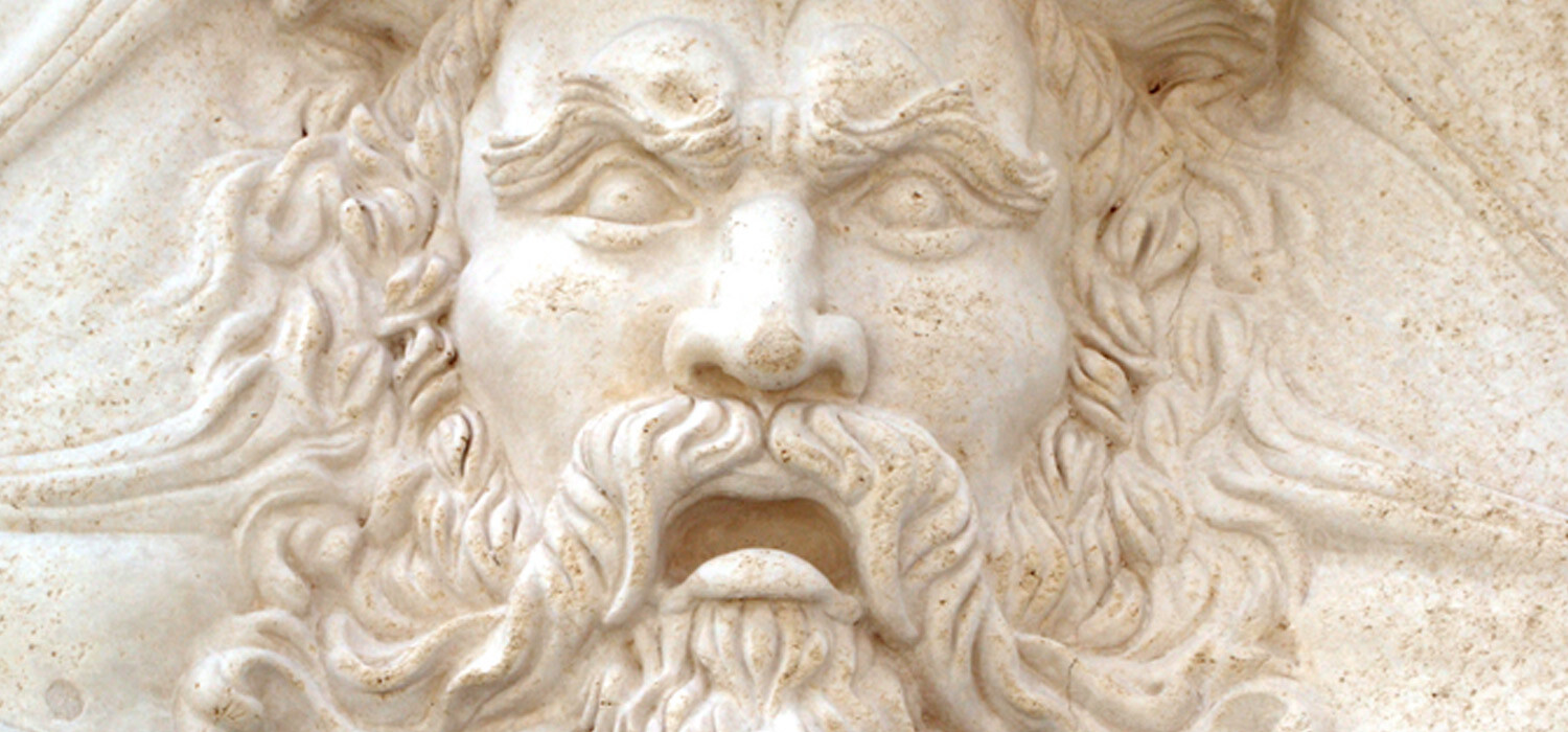 cast stone bearded man face