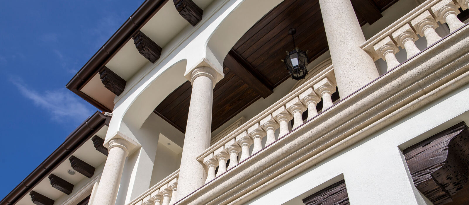 cast stone columns and balustrade on balcony